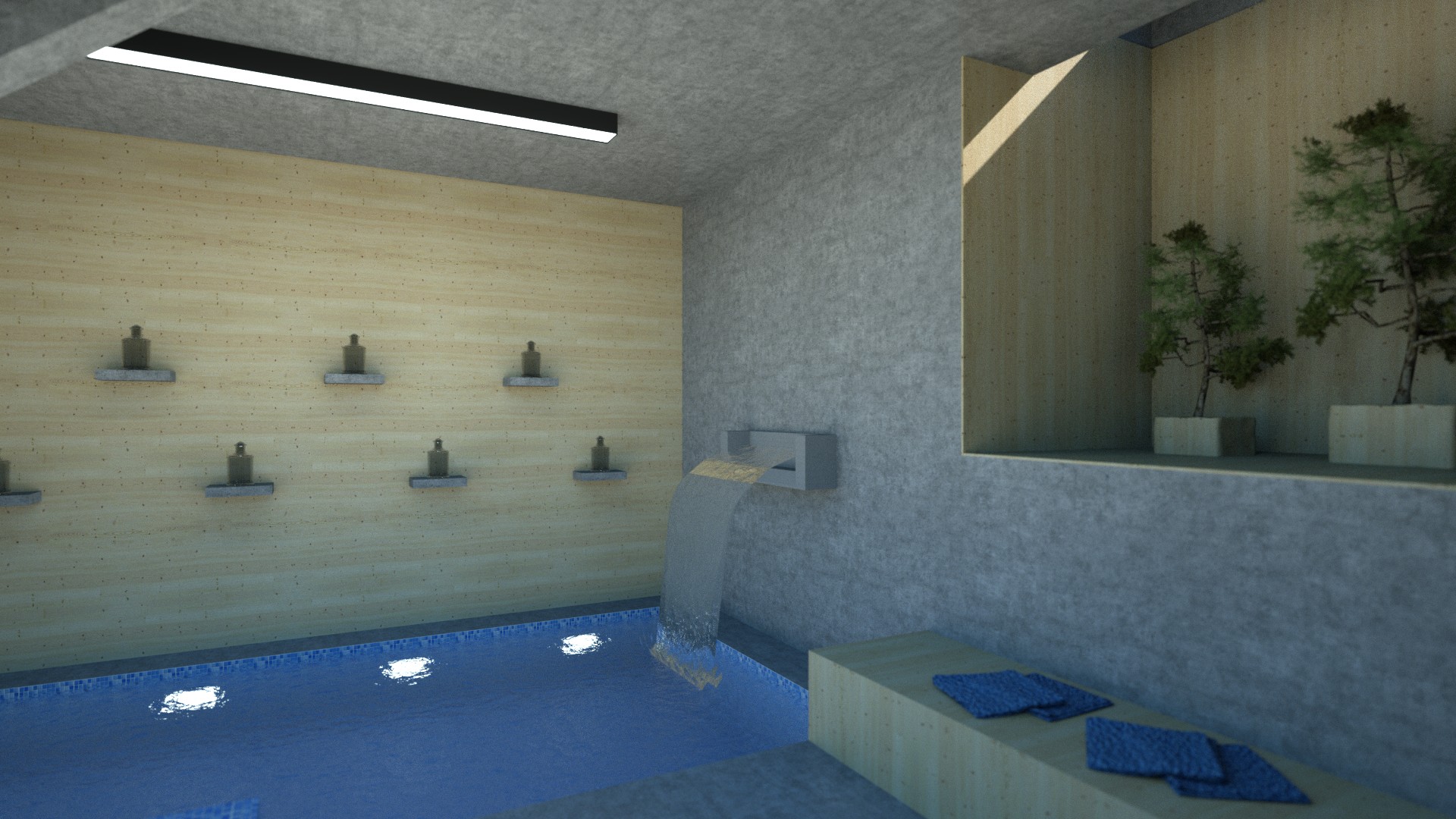 A modern indoor swimming pool with a waterfall feature, illuminated by a linear light fixture and accented with potted plants in a recessed niche. The walls are a combination of textured concrete and light wood paneling, creating a serene and spa-like atmosphere. Small wall-mounted fixtures are evenly spaced along the wooden wall. By Modify Architects
