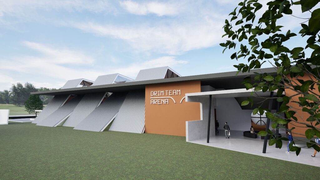 Modern architectural rendering of the Drimalas Basketball Academy, showcasing a contemporary building with a striking facade featuring angled gray panels and a vibrant orange accent wall displaying "DRIM TEAM ARENA" lettering. People are gathered near the entrance under a concrete canopy, with lush greenery framing the right side of the building against a bright, cloudy sky. The design emphasizes a dynamic and inviting atmosphere for a basketball training facility. By Modify Architects