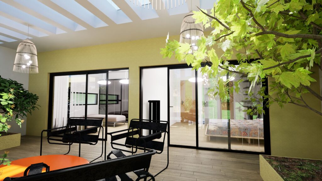 Modern interior courtyard with black chairs, a vibrant green tree, and glass doors leading into a bright living space with a white sofa and patterned bed, illuminated by hanging woven light fixtures and a striped ceiling. By Modify Architects