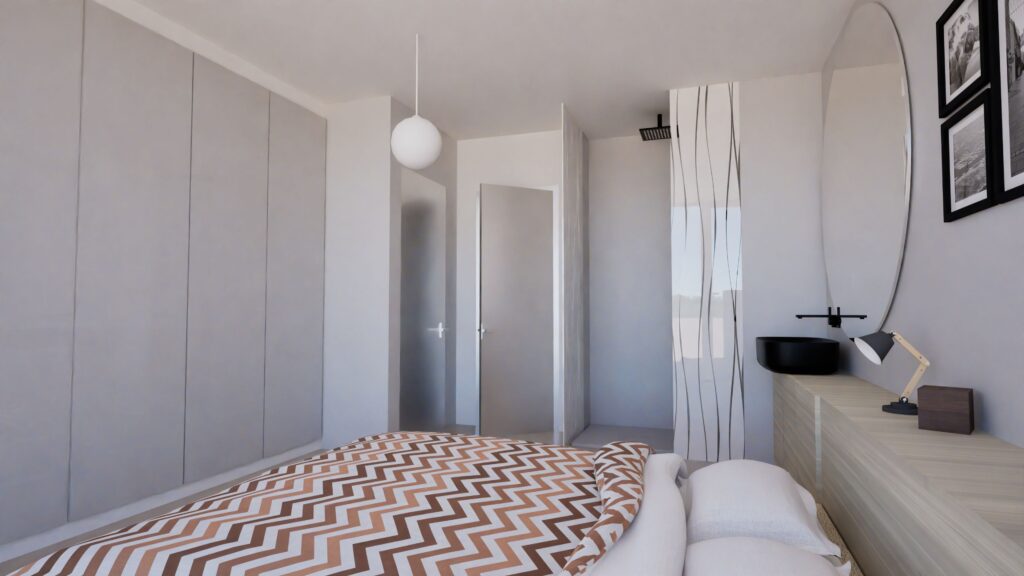 A bright, minimalist bedroom interior featuring a large wardrobe, a patterned bed, a bedside table with a lamp, and a view through sheer curtains to a window, showcasing a clean and contemporary design. By Modify Architects