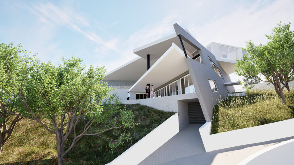 A low-angle view of a modern, angular hillside residence with a white walkway leading to an entrance below a cantilevered upper level. Two figures stand on a balcony, overlooking the landscape. The house features a mix of white and gray tones, with large windows and a striking architectural design integrated into a natural, grassy slope under a bright blue sky. By Modify Architects
